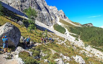 Hikers near Dobbiaco, Dolomites, Italy. Murray Foubister@Flickr