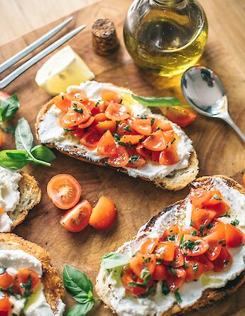 Bruschetta originates in Italy. Calum Lewis@Unsplash