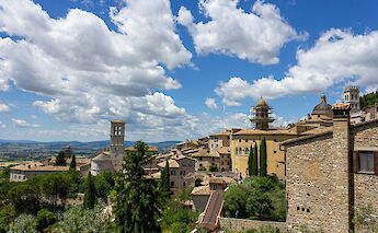 Blue skies above Assisi, Italy. Unsplash:Fernando Tavora