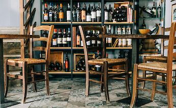 Italian wine shop, Italy. Unsplash:Gabriella Clare Marino