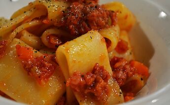 <i>Tagliatelle al ragù bolognese</i> is the local dish in Emilia-Romagna, Italy. Pug Girl@Flickr