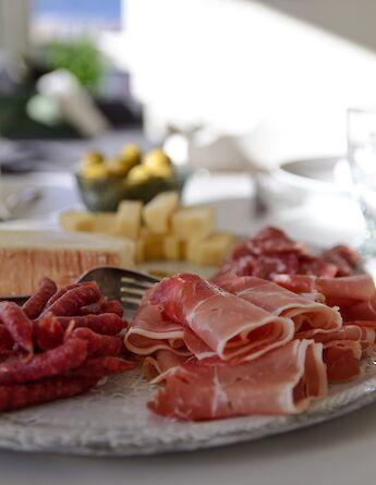 Great prosciutto hams in Italy! Daniel Uvegard@Unsplash