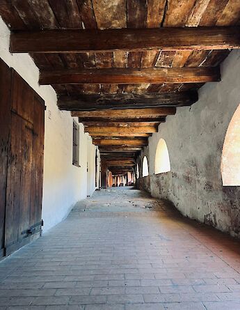 Ancient walkway in Brisighella, Italy. Unsplash@Sara Santandrea