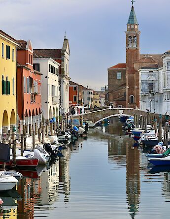 Canal in Chioggia, Italy. Unsplash@Claudio Poggio