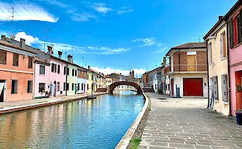 Colorful houses in Comacchio, Italy. Unsplash@Andreas Krumpholz