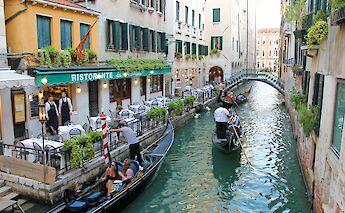 Gondolas and restaurants, Venice, Italy. CC:TO