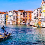 Gondolas in the famous Grand Canal of Venice, Italy. Kitsuman@Unsplash