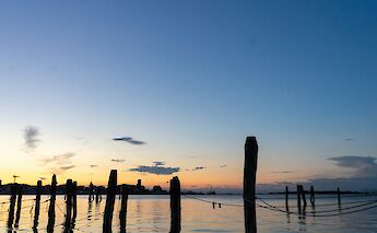 Sunset at the ocean in Chioggia, Italy. Unsplash@Stacy Ropati