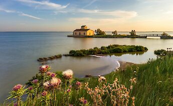 View of the sea from Comacchio, Italy. Unsplash@Samuele Bertoli