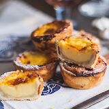 Pastel de nata is a Portuguese egg custard tart pastry! Diliara Garifulina@Unsplash