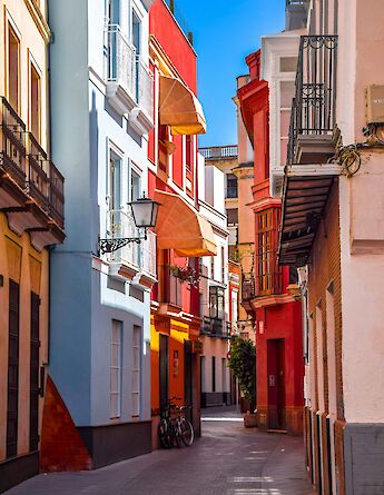 Colorful houses in Seville, Spain. Unsplash:Tom Podmore
