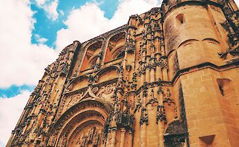 Orange building in Arcos de la Frontera, Spain. Unsplash:Antonio Morillas
