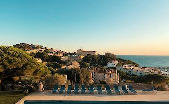 Sant Feliu de Guixols at sunset, Spain. Unsplash:Dominik Bednarz