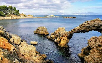 Yellow rock along the coast, Girona, Spain. Unsplash:Jordi Jimenez