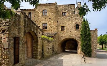 A medieval villa in the sunshine, Monells, Spain. Unsplash:Manuel Torres Garcia