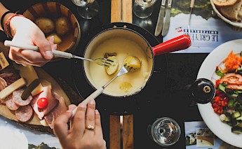 Fondue is a favorite in Switzerland! Angela Pham@Unsplash