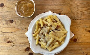 A traditional lunch of Älplermagronen in Switzerland. CC:Adrian Michael