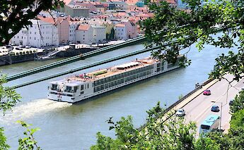 A river barge in Passau, Germany. Andi Steiner@Unsplash