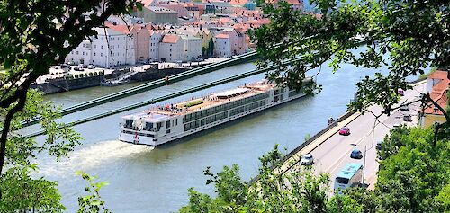 A river barge in Passau, Germany. Andi Steiner@Unsplash
