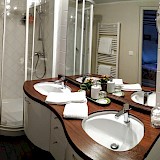 Extra large bathroom equipped with luxurious toiletries