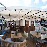 Exterior deck and lounge area, Merlijn, bike and boat tour