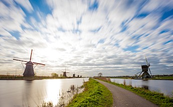 Kinderdijk biking among windmills.