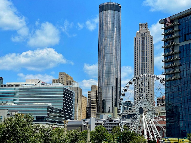 Atlanta's skyline stuns in daylight, with SkyView panoramic wheel. Unsplash:Yaroslav Muzychenko