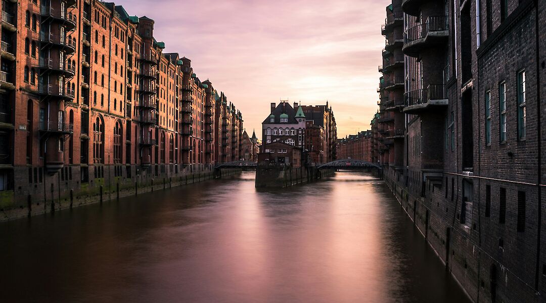 Waterway at sunset, Hamburg, Germany. Adrian Degner@Unsplash