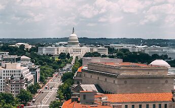 Constitution Avenue with Capitol Hill in the background. Unsplash:Vlad Tchompalov