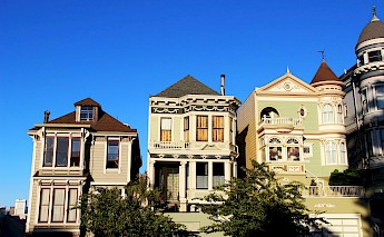 Colorful Victorian-style houses at Alamo Square, known as the Painted Ladies, in San Francisco.