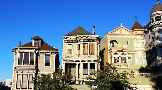 Colorful Victorian-style houses at Alamo Square, known as the Painted Ladies, in San Francisco.