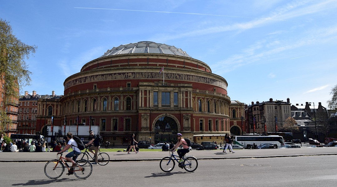 Passing by the Royal Albert Hall, on a bike tour. Unsplash:Matthew Waring