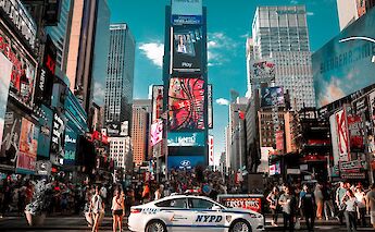 Times Square, Manhattan. Unsplash: Victor He