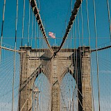 View of Brooklyn Bridge cables. Unsplash: Benny Rotlevy Evlcsdowbra