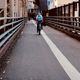 Cycling in the streets of NYC. Unsplash:Johny Vino