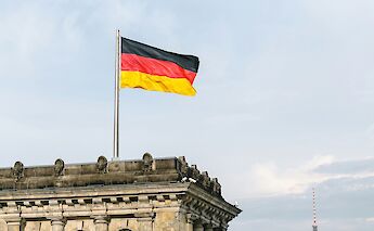Flag above the Reichstag, Berlin, Germany. Getty Images@Unsplash
