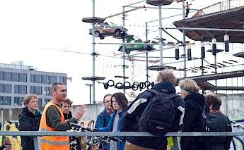 Listening to the tour guide, Berlin, Germany. CC:Berlin on Bike
