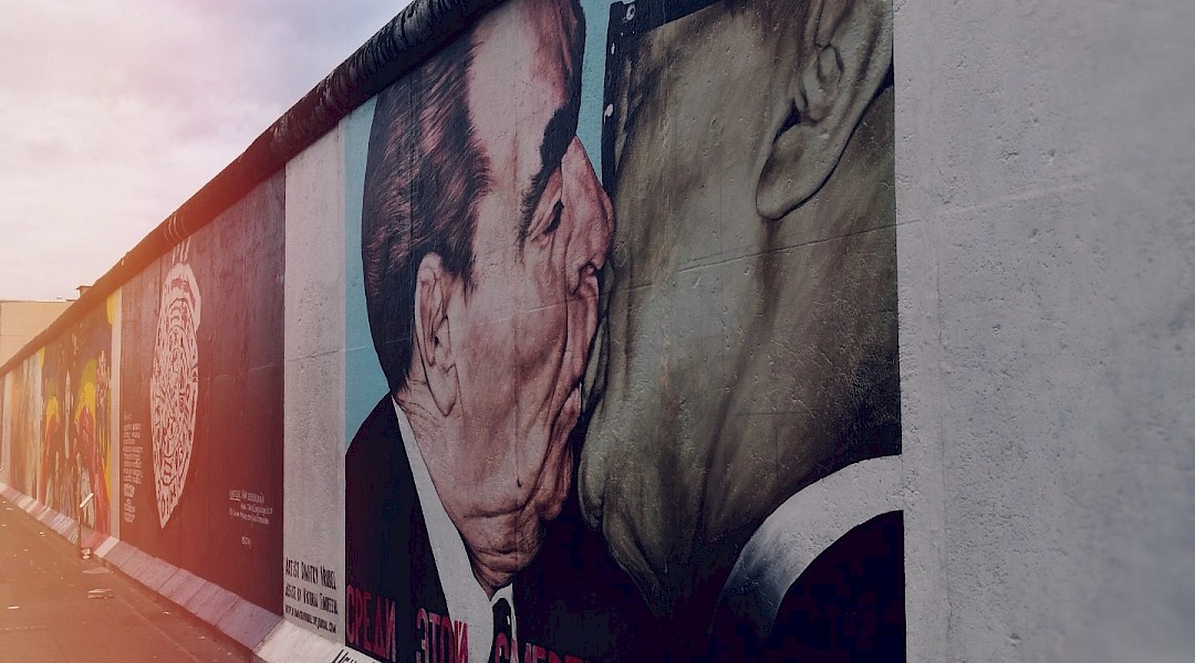 Berlin Wall mural. Unsplash:Rugile