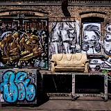 Berlin Graffiti and sofa. Unsplash:Robby McCullough