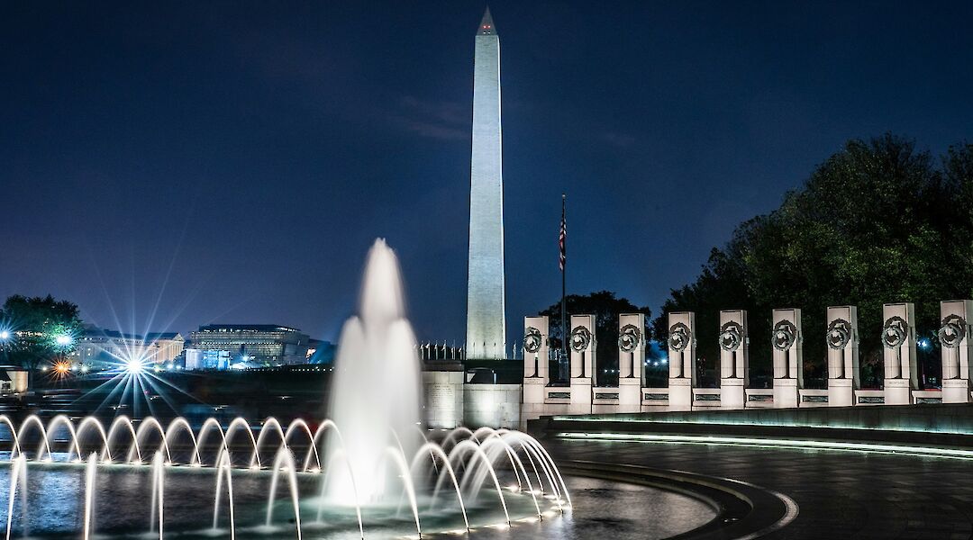 World War II Memorial with the Washington Monument behind it, Washington DC. Unsplash: Jared Short