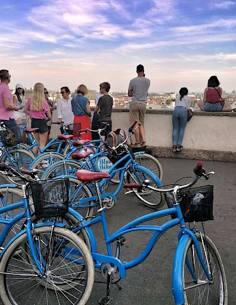 Cyclists gathered and enjoying a view over the city from the Upper Town in Zagreb.