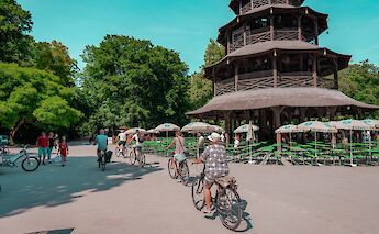 Cycling past the Great Pagoda, Munich, Germany. CC:Radius Tours