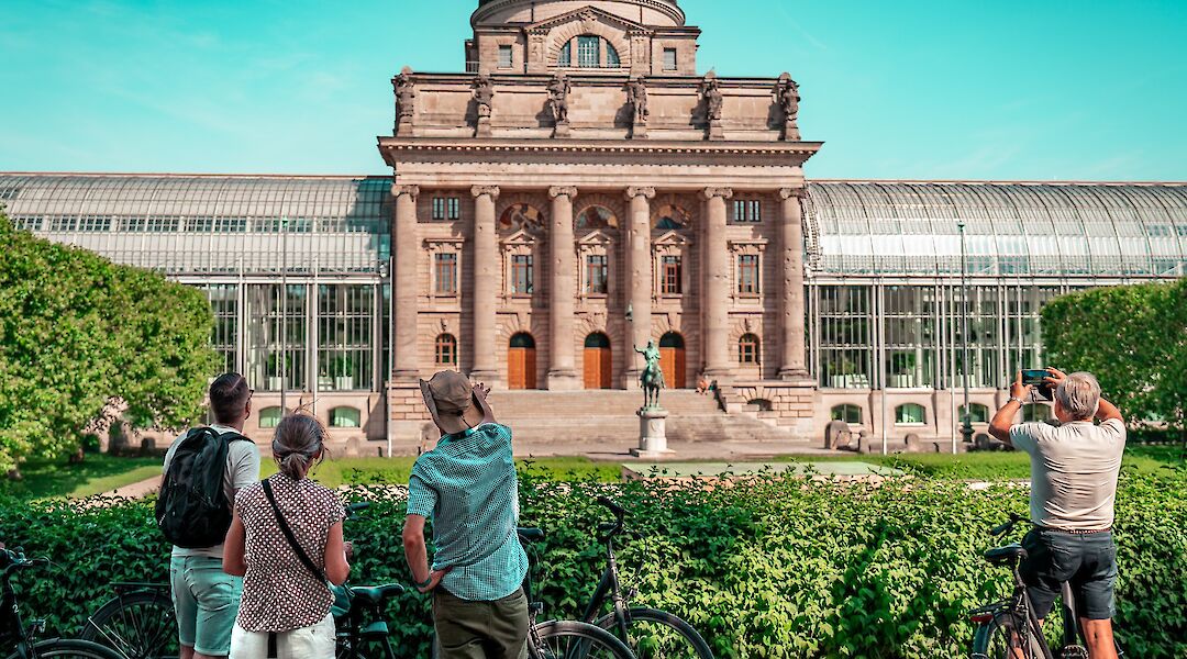 Listening to the tour guide, Munich, Germany. CC:Radius Tours