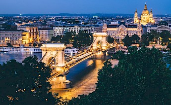 Szechenyi Chain Bridge at night, Budapest. Unsplash:Dan Freeman