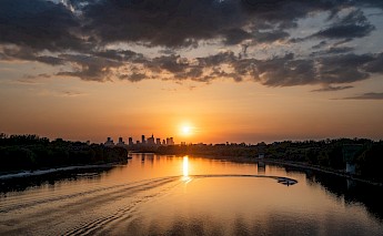 Vistula River at sunset, Krakow. Unsplash:Piotr Szajewski