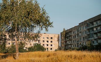 Communist era apartment blocks. Kateryna Hliznitsova@Unsplash