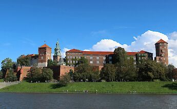 Wawel Castle from afar, Krakow, Poland. Unsplash: Chris Linnett
