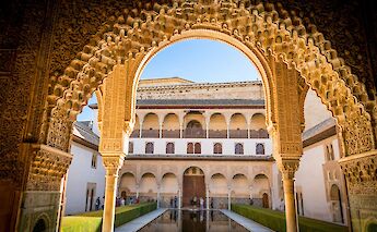 Ornate archway, Granada, Spain. Unsplash:Austin Gardner