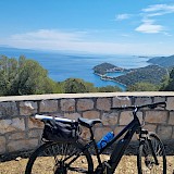Bike rested at the viewpoint, overlooking Dubrovnik's harbour.