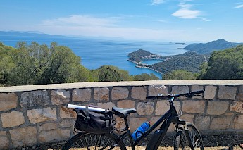 Bike rested at the viewpoint, overlooking Dubrovnik's harbour.